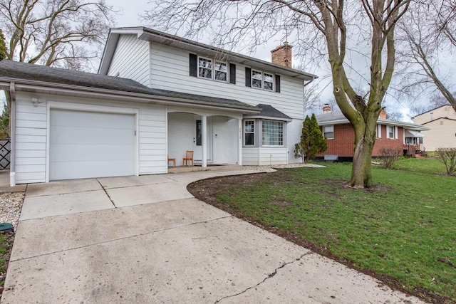 traditional home featuring a chimney, concrete driveway, a front lawn, a garage, and brick siding