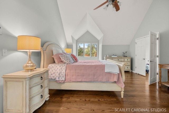 bedroom with dark wood-type flooring, ceiling fan, and vaulted ceiling