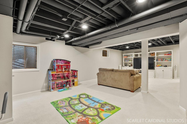 game room featuring baseboards and carpet floors