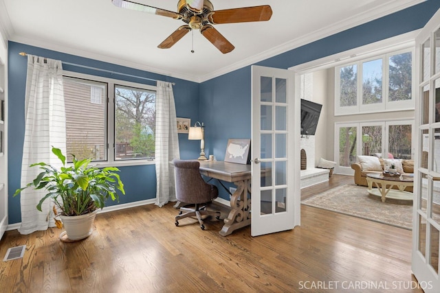 office space featuring french doors, visible vents, and a wealth of natural light