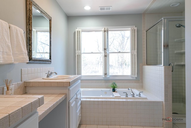 full bathroom with vanity, visible vents, recessed lighting, a stall shower, and a bath