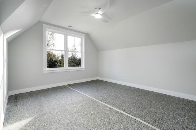 bonus room with visible vents, ceiling fan, lofted ceiling, and baseboards