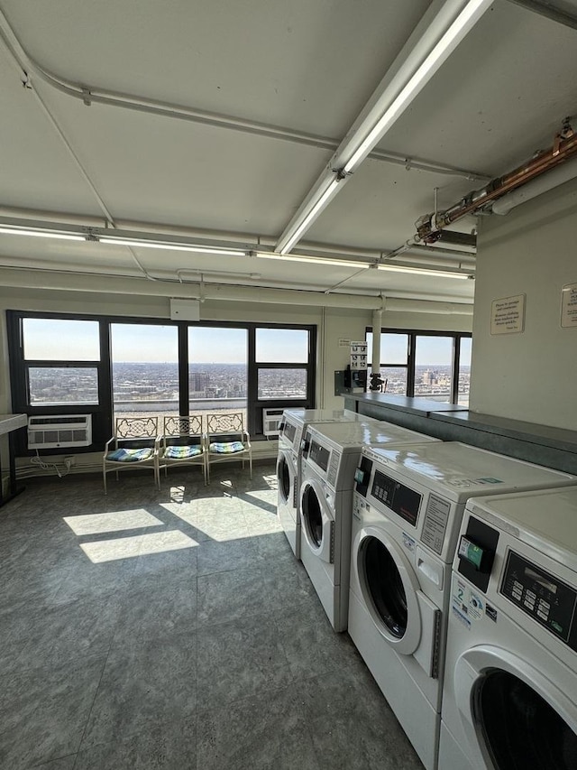 shared laundry area with separate washer and dryer