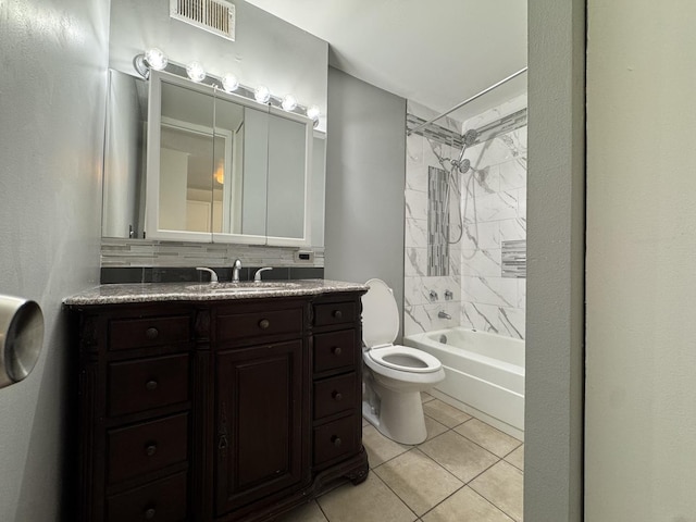 bathroom with tile patterned floors, visible vents, toilet, bathing tub / shower combination, and vanity