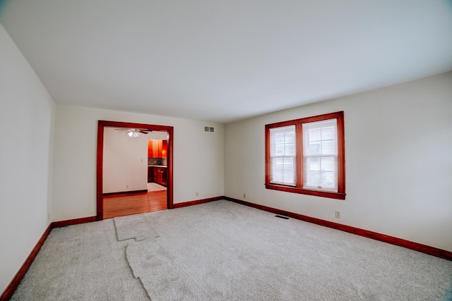 319 S 3rd St, Watseka, IL 60970 - empty room with carpet flooring and baseboards