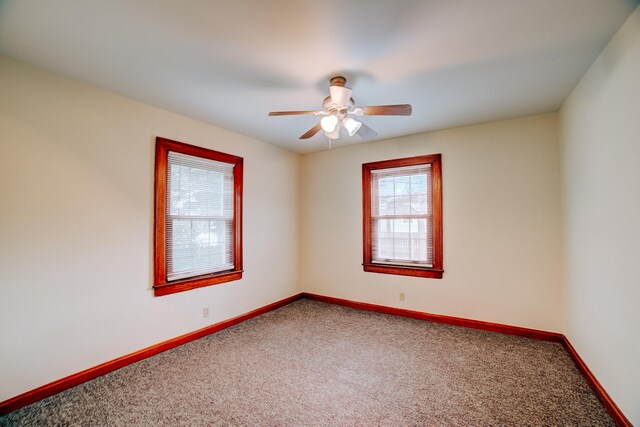 319 S 3rd St, Watseka, IL 60970 - spare room with carpet, ceiling fan, and baseboards