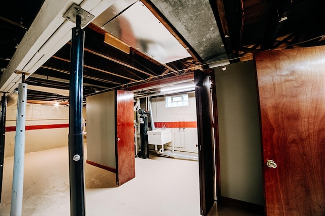 319 S 3rd St, Watseka, IL 60970 - below grade area featuring a sink
