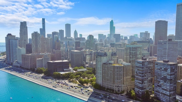 property's view of city with a water view