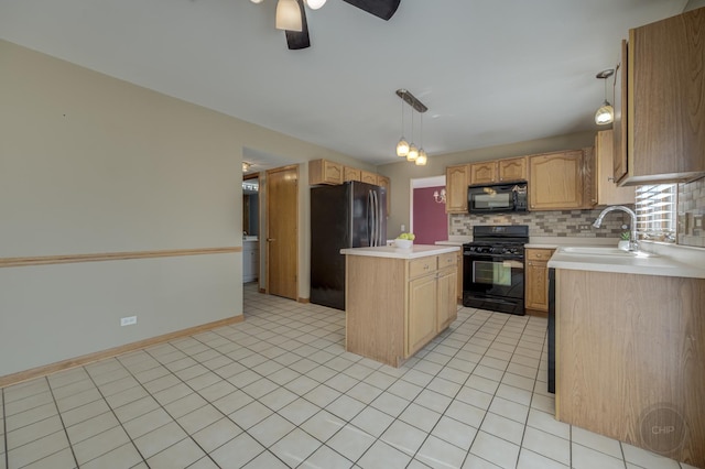 kitchen featuring backsplash, a center island, light countertops, black appliances, and a sink