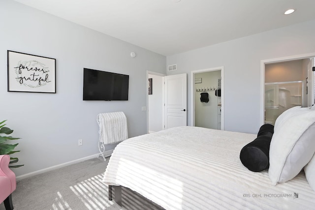 bedroom featuring carpet, visible vents, baseboards, ensuite bath, and recessed lighting