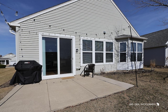 rear view of house featuring a patio area