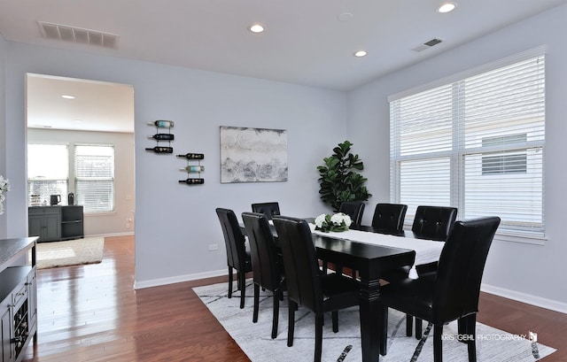 dining area featuring recessed lighting, wood finished floors, visible vents, and baseboards