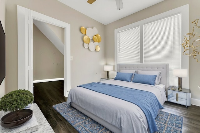 216 W 105th St, Chicago, IL 60628 - bedroom featuring baseboards, wood finished floors, and a ceiling fan