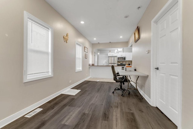 216 W 105th St, Chicago, IL 60628 - office space featuring visible vents, dark wood-type flooring, a sink, recessed lighting, and baseboards