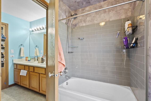 bathroom with double vanity, shower / bath combination, and a sink