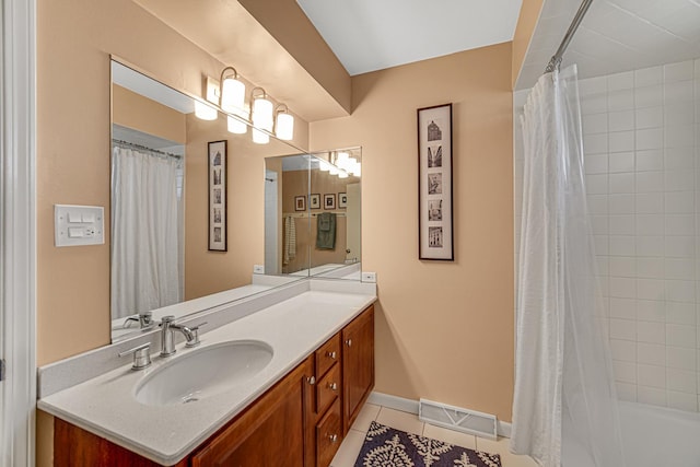 full bathroom featuring visible vents, shower / bath combo, tile patterned flooring, baseboards, and vanity