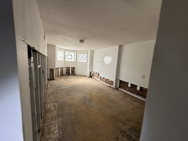 interior space featuring concrete floors