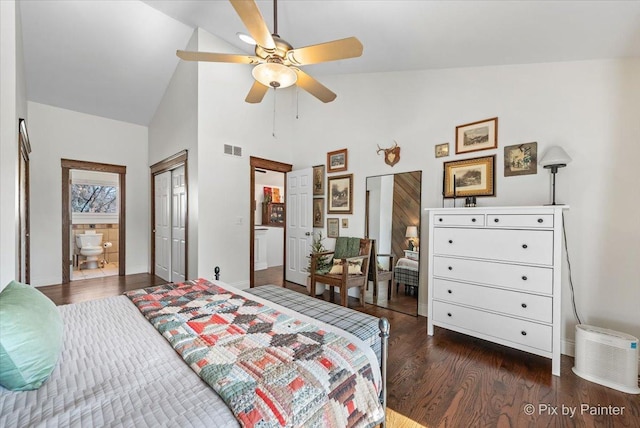 bedroom with baseboards, wood finished floors, visible vents, and high vaulted ceiling