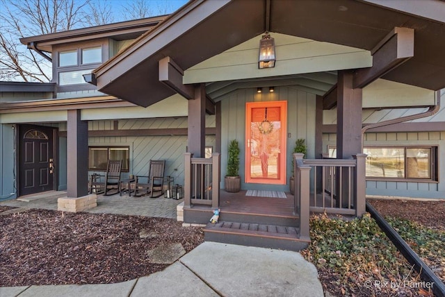 property entrance featuring covered porch