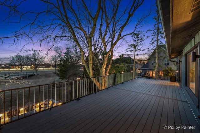 wooden deck with visible vents