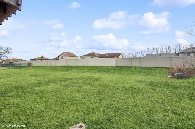 view of yard with fence