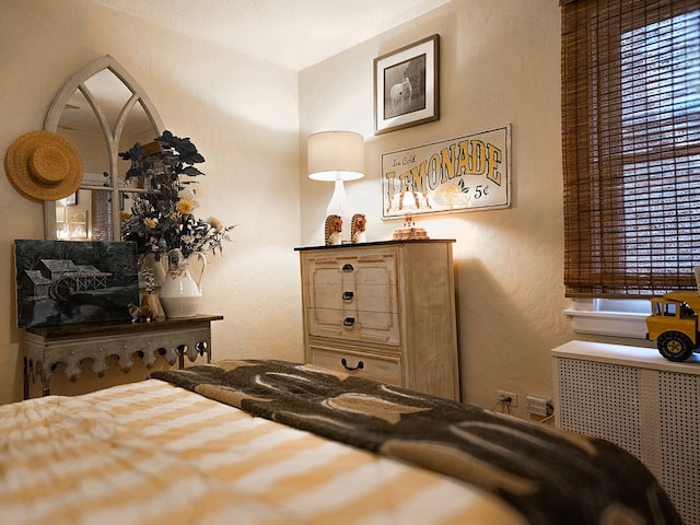 bedroom with a textured wall