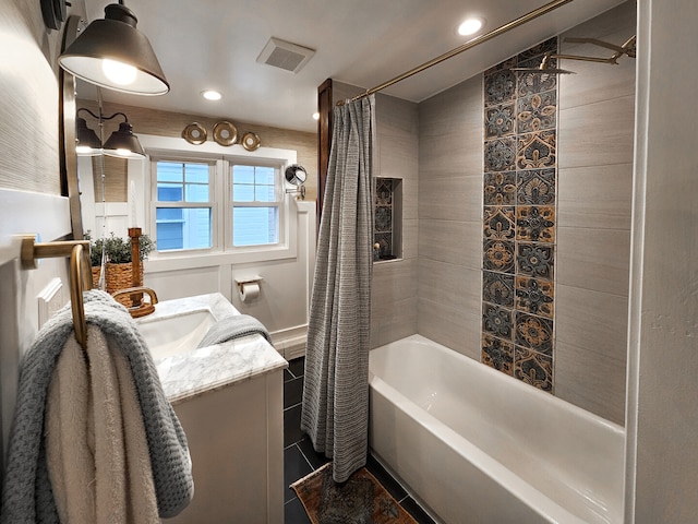 full bath with visible vents, recessed lighting, vanity, and shower / bath combo