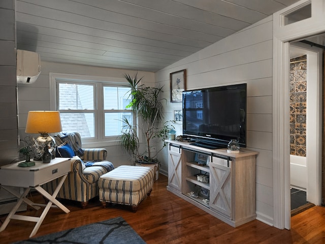 interior space featuring wooden walls, wood finished floors, vaulted ceiling, an AC wall unit, and wood ceiling