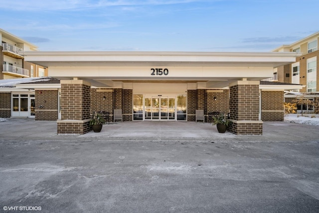 view of building exterior featuring a carport