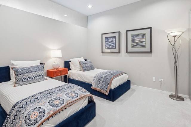 bedroom with recessed lighting, baseboards, and carpet flooring