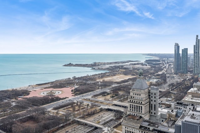 drone / aerial view with a view of city and a water view