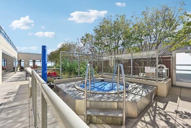 view of patio / terrace with a community hot tub