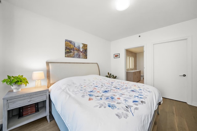 bedroom with wood finished floors