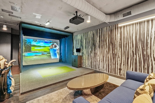 home theater with golf simulator and visible vents