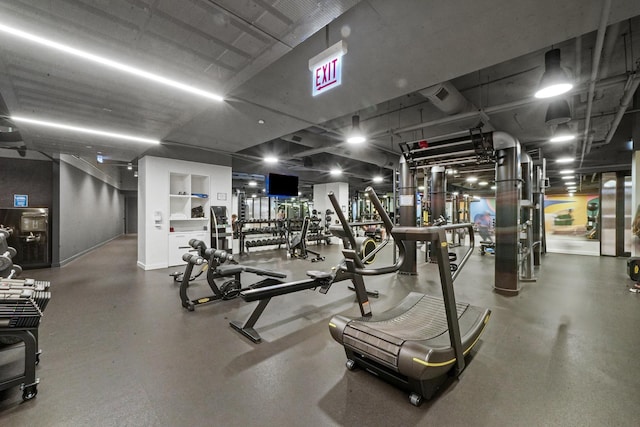 exercise room with baseboards