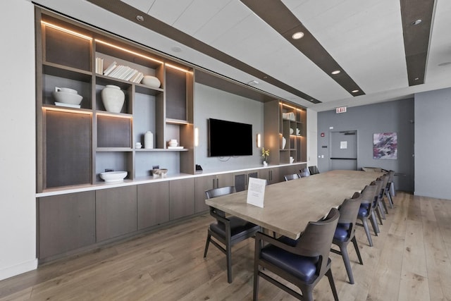 dining area with recessed lighting and light wood finished floors