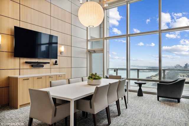 dining room with a wall of windows