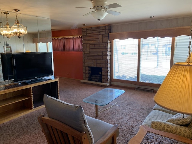 living room with visible vents, a ceiling fan, carpet, crown molding, and a fireplace