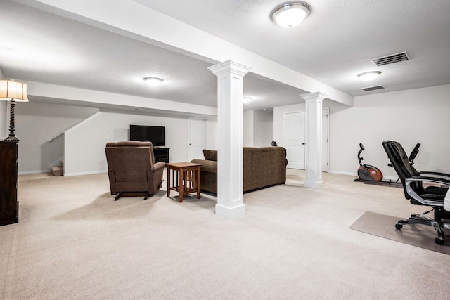 office featuring visible vents, light colored carpet, and baseboards