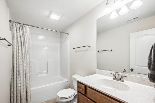 full bath with visible vents, toilet, vanity, and shower / tub combo