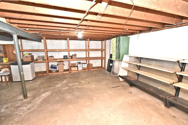 view of patio featuring central AC unit and fence