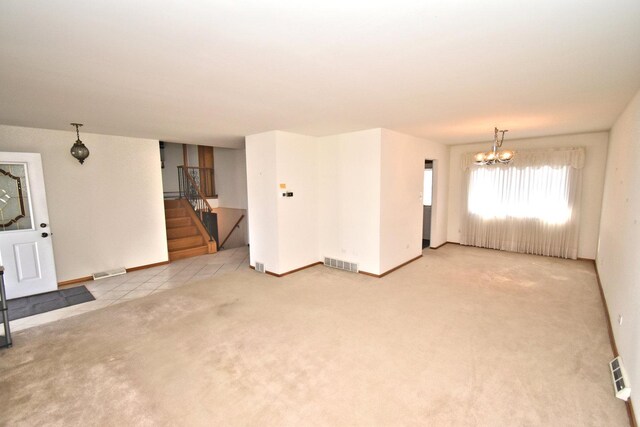 kitchen with light countertops, light tile patterned floors, white appliances, a ceiling fan, and a sink