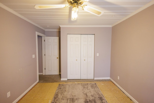 unfurnished bedroom featuring a closet, baseboards, and ceiling fan