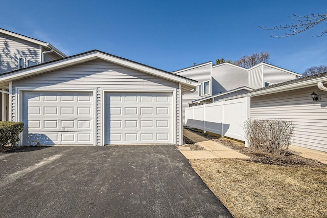 garage with fence