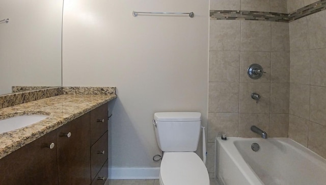 full bathroom with toilet, vanity, baseboards, and washtub / shower combination