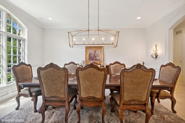 dining space with recessed lighting, visible vents, a chandelier, and crown molding