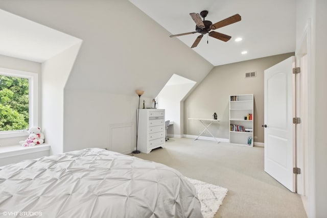 carpeted bedroom featuring a ceiling fan, visible vents, baseboards, recessed lighting, and vaulted ceiling