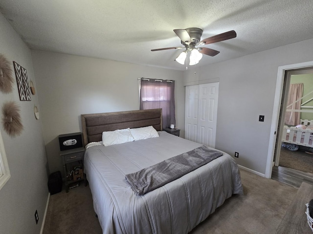 carpeted bedroom with a closet, baseboards, a textured ceiling, and ceiling fan