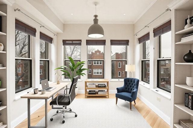 office with plenty of natural light, wood finished floors, and ornamental molding