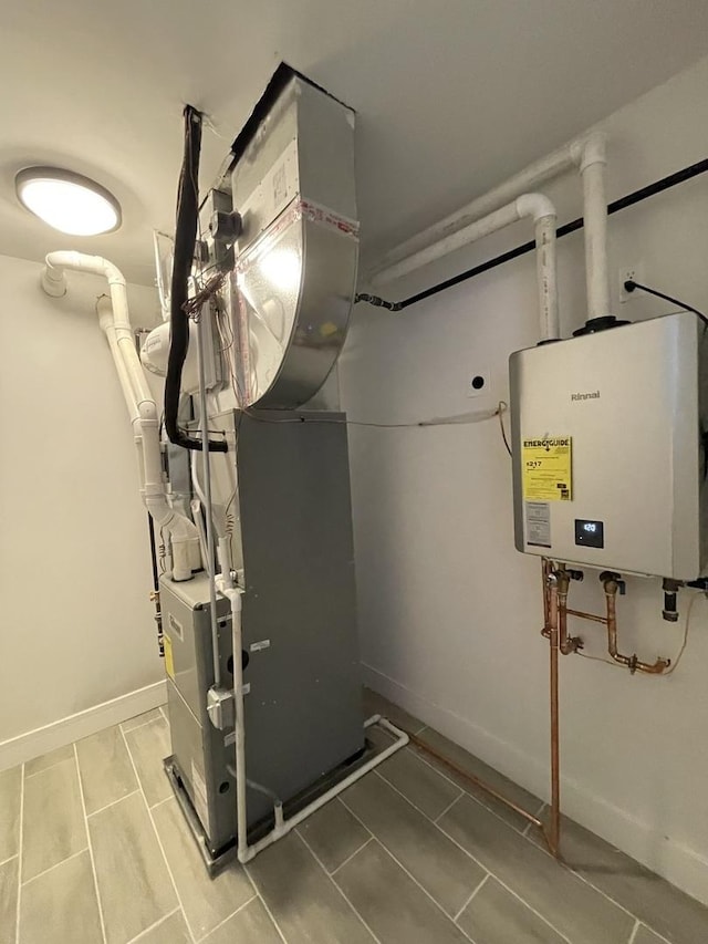 utility room with water heater